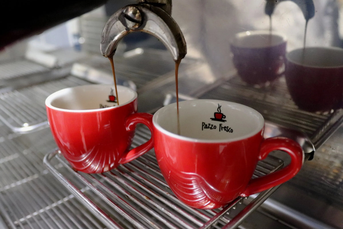 Crazy Fresh Coffee hero - coffee pouring into red cup